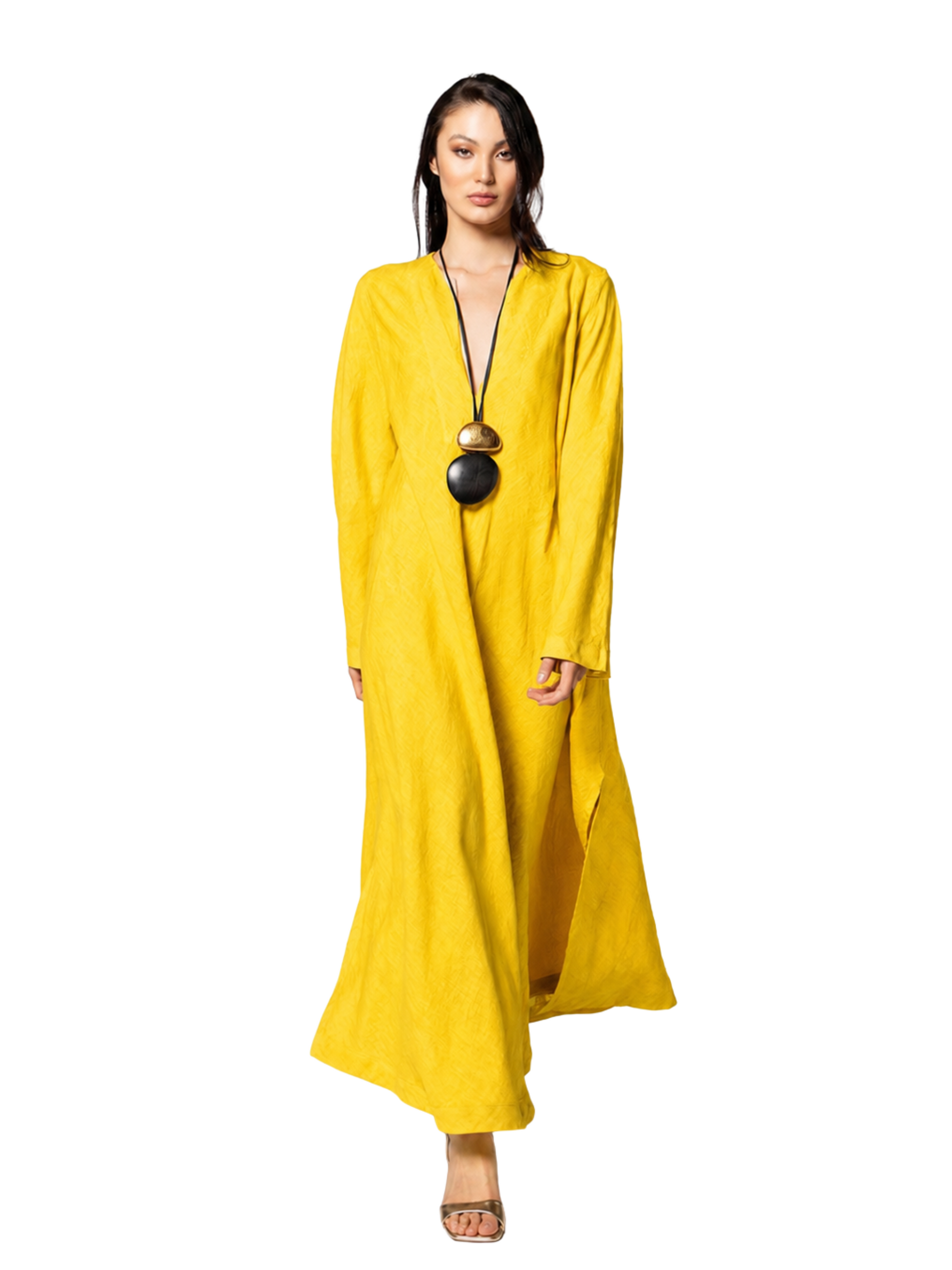  long-sleeved, loose-fitting yellow maxi dress with a deep V-neckline 