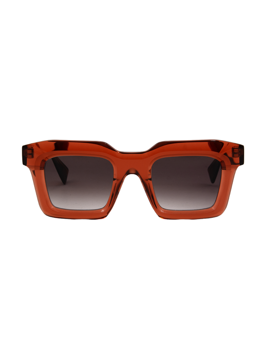 Sunglasses with a transparent brown frame and gradient lenses