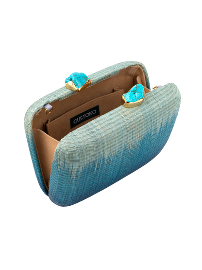 blue ombre buntal fiber clutch with natural stones