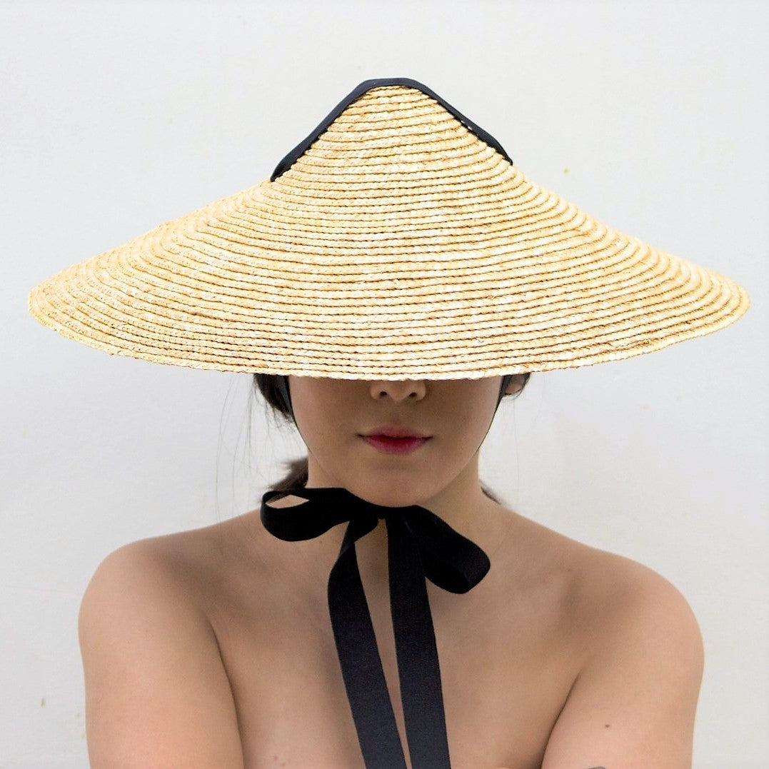 Asian conical Handwoven natural wheat straw hat on model