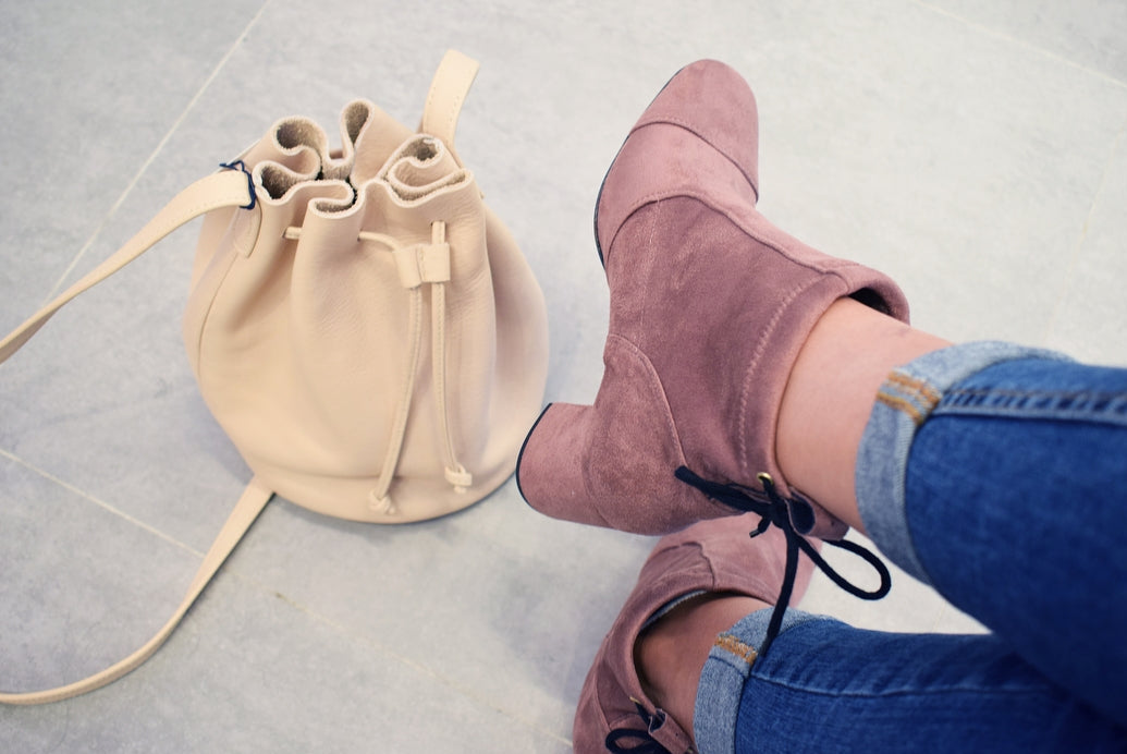  rose-colored suede medium heel booties