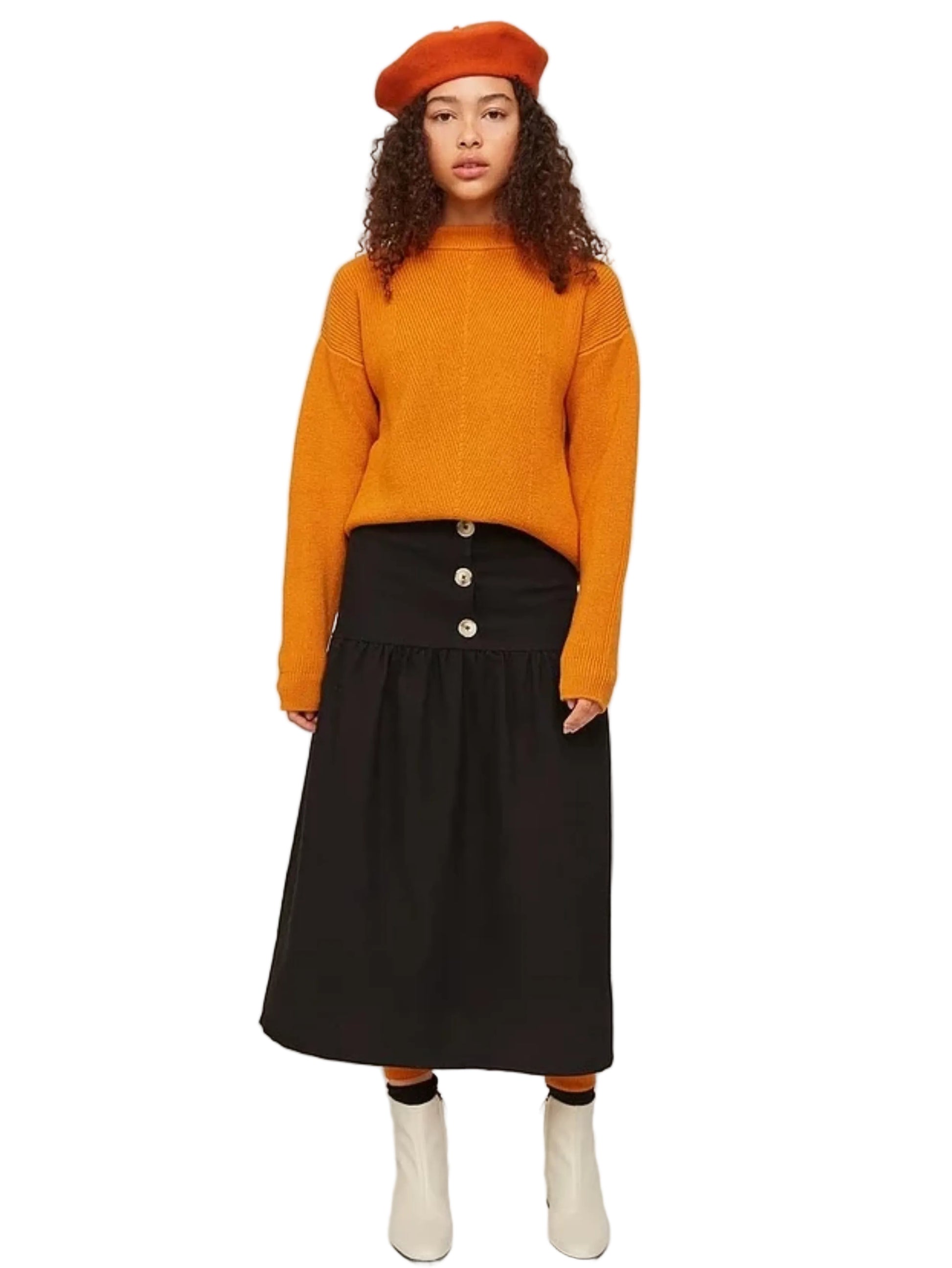  black tiered skirt with a button front closure